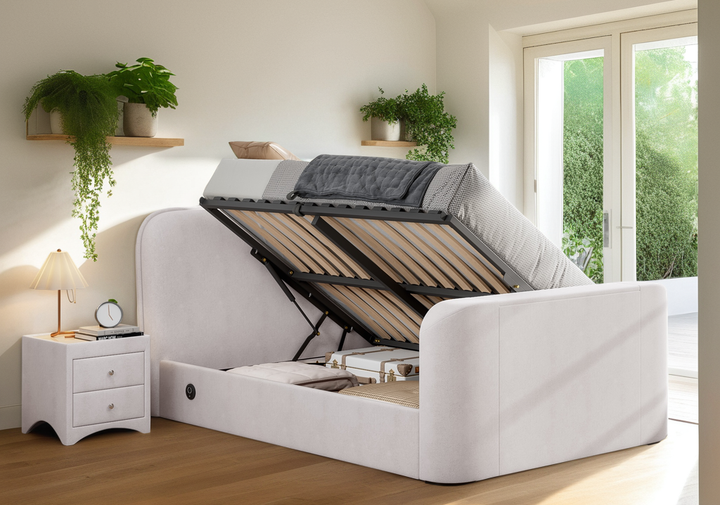 Arla Ottoman Storage TV Bed with USB Charging in Luxury Natural Cream Fabric.