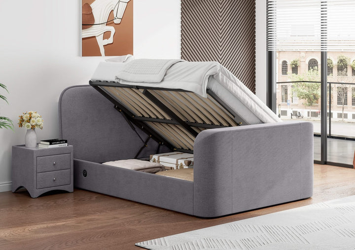 Arla Ottoman Storage TV Bed with USB Charging in Luxury Grey Fabric.