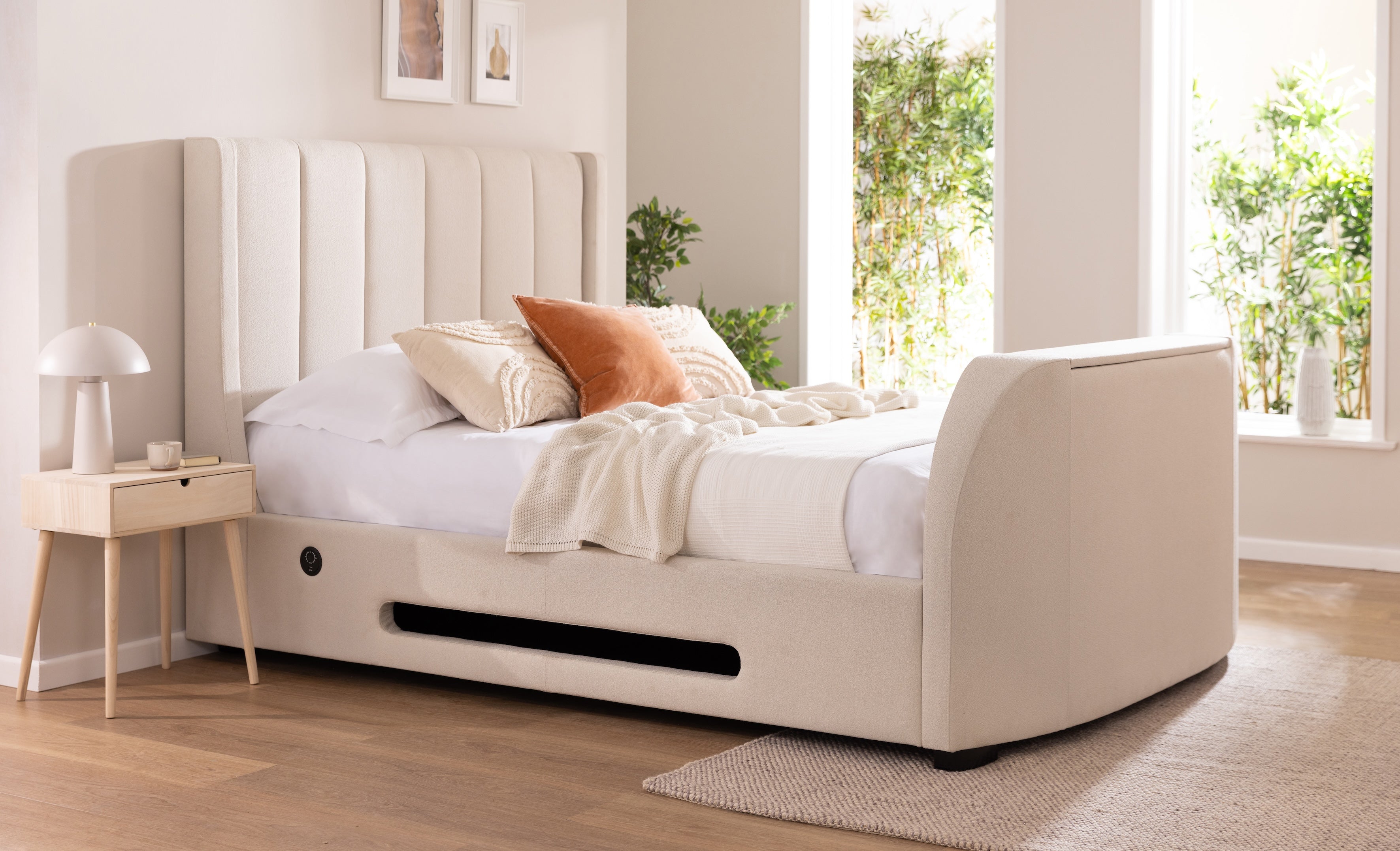 Bed that has online tv in footboard